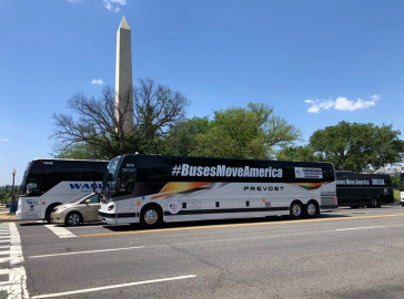 Prevost bus in front of Washington monument